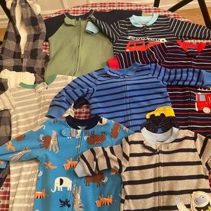 (8) 12 month footie pajamas
